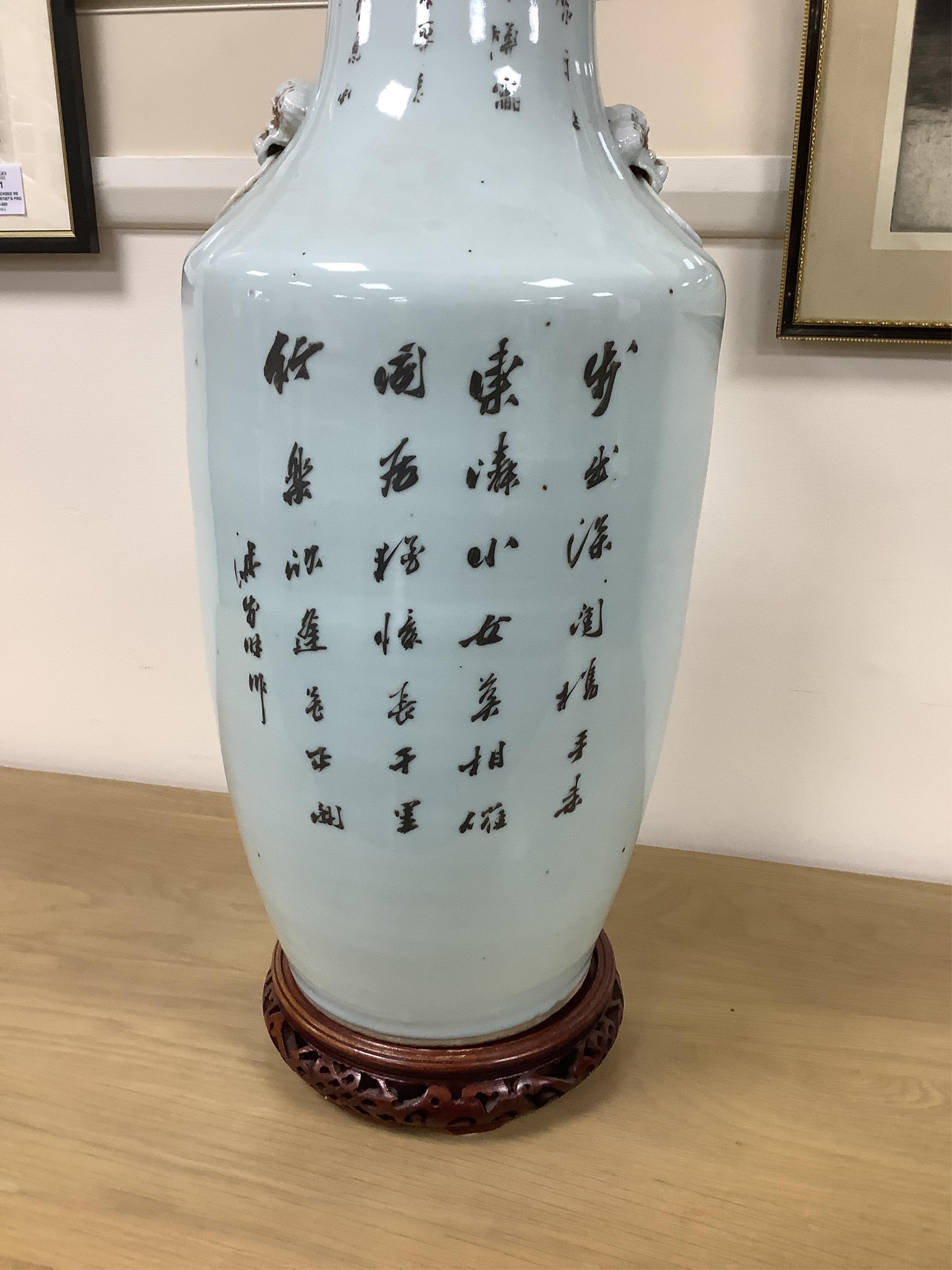 An early 20th century Chinese famille rose vase on stand. 57cm high. Condition - good